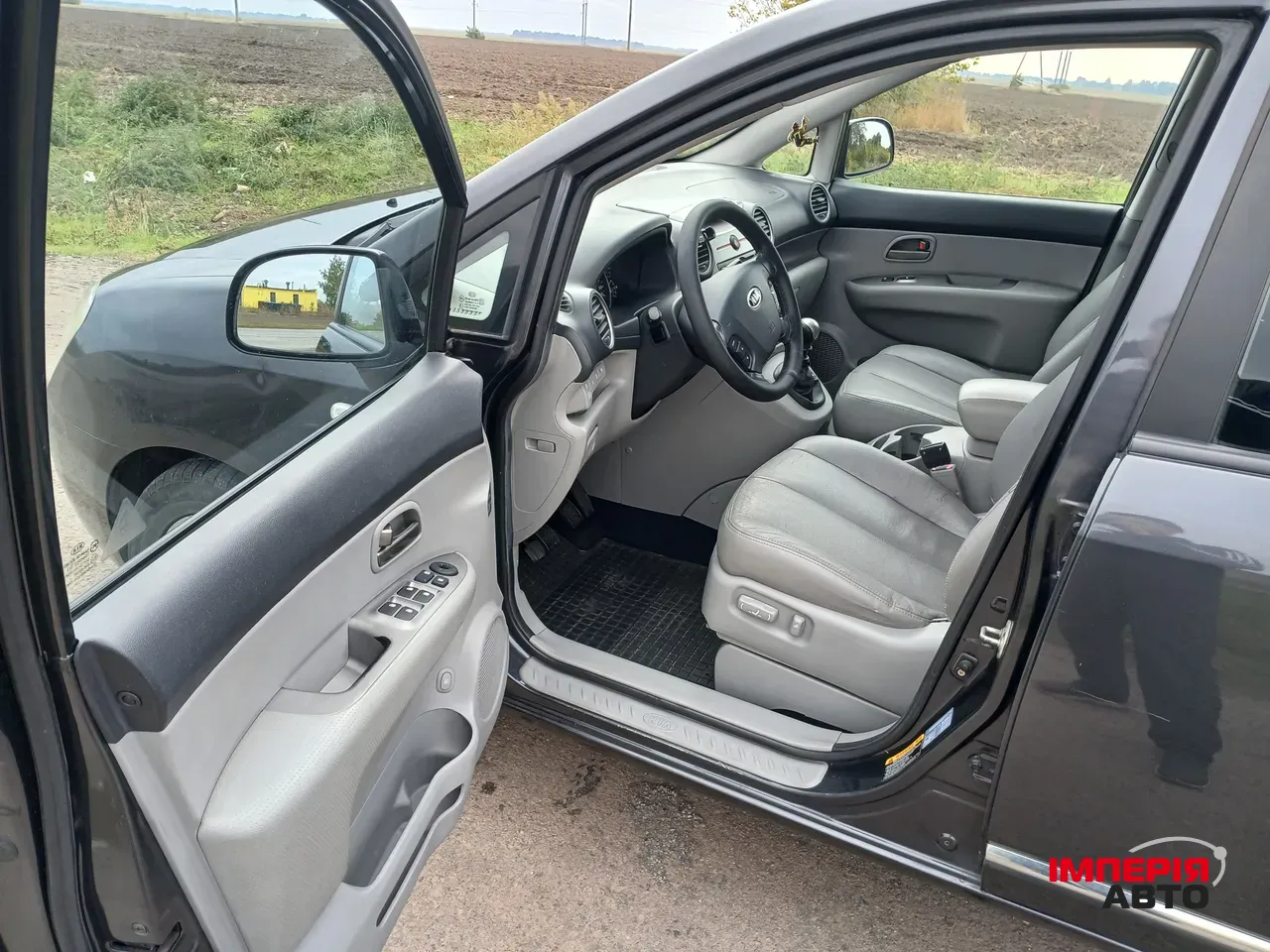 Kia Carens - фото 7