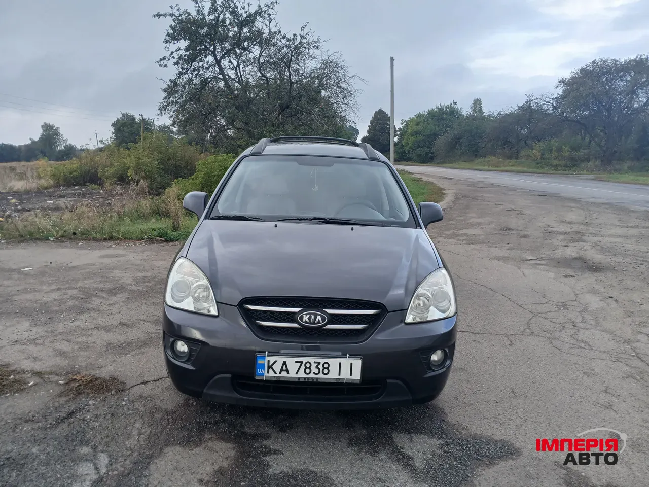 Kia Carens - фото 5