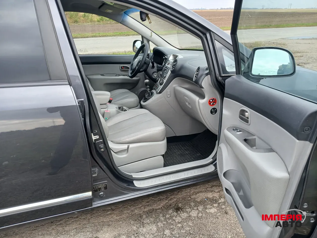 Kia Carens - фото 8