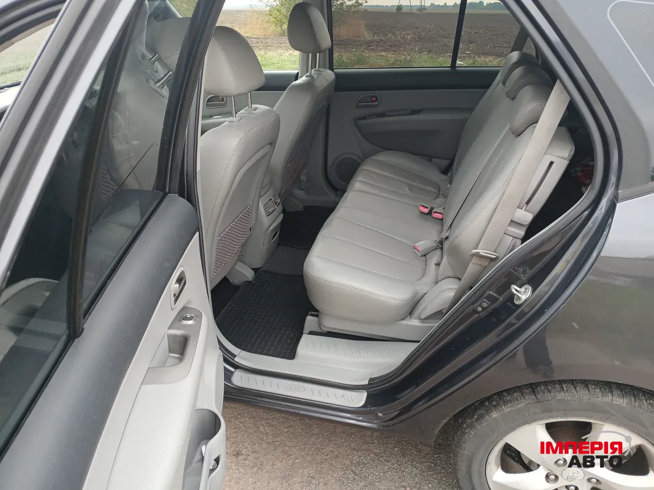 Kia Carens - фото 10