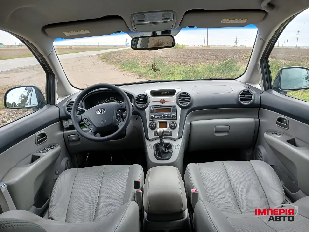 Kia Carens - фото 9
