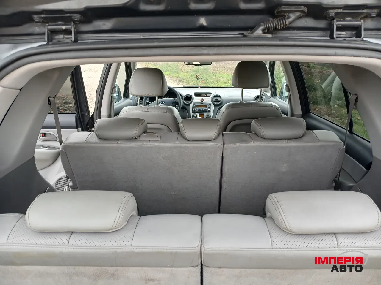 Kia Carens - фото 6