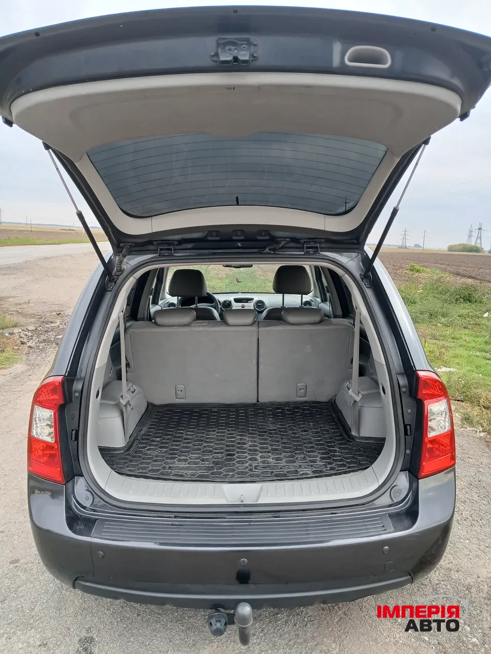Kia Carens - фото 11