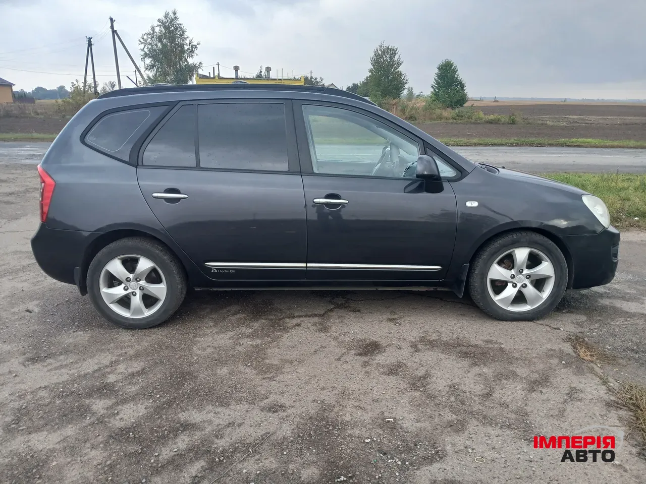 Kia Carens - фото 4