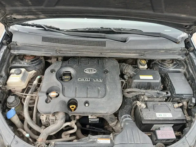 Kia Carens - фото 5