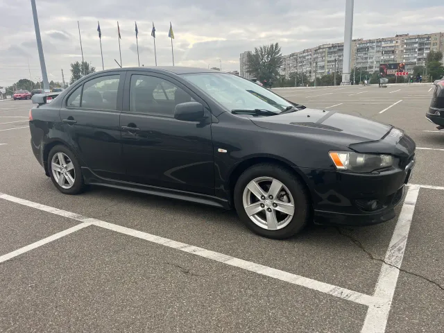 Mitsubishi Lancer - фото 1