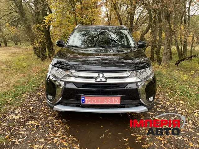 Mitsubishi Outlander - фото 1
