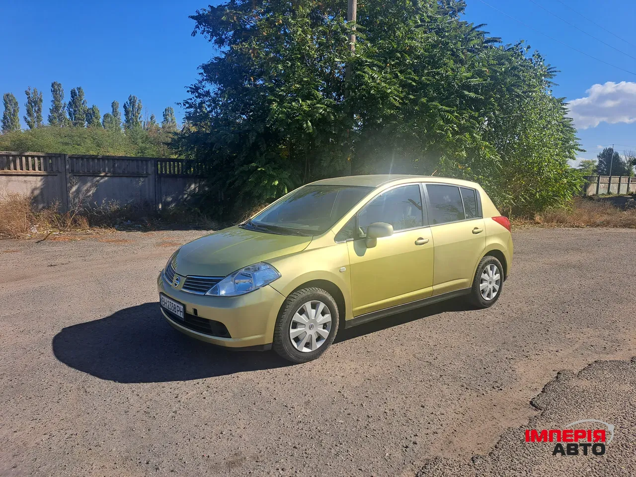 Nissan Tiida - фото 3