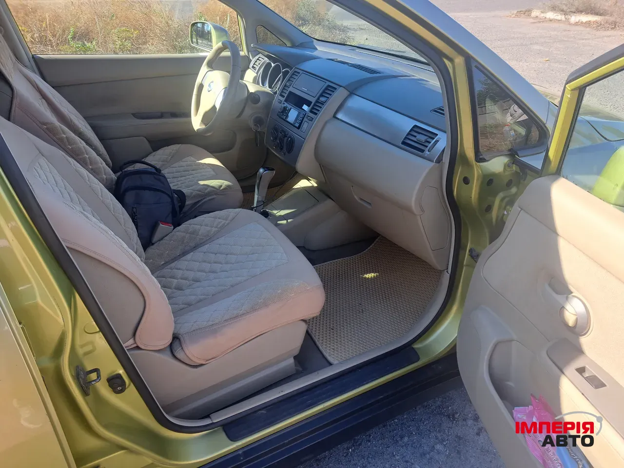 Nissan Tiida - фото 6