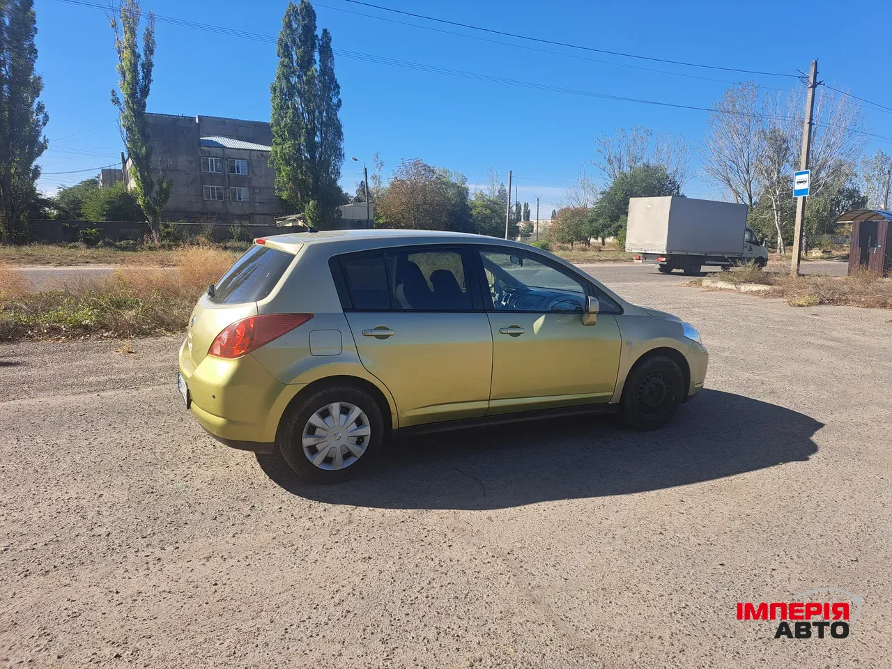 Nissan Tiida - фото 9