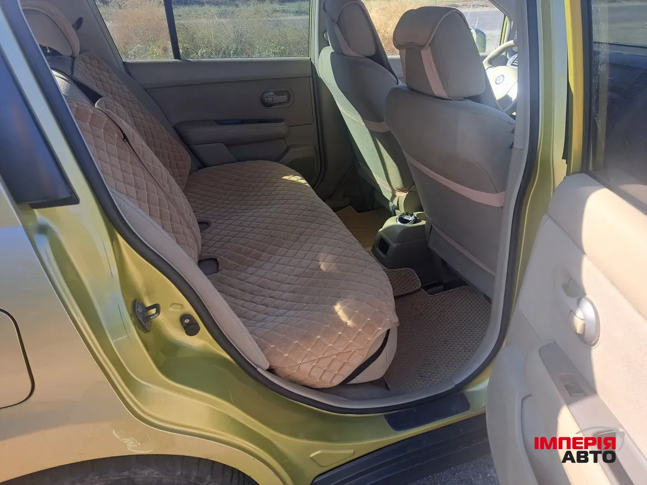 Nissan Tiida - фото 10