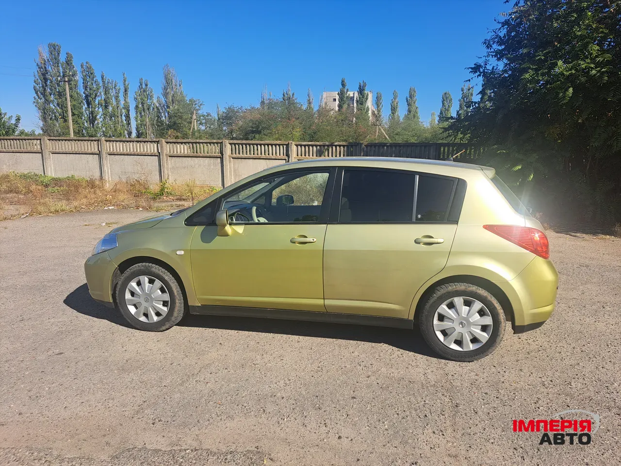 Nissan Tiida - фото 5