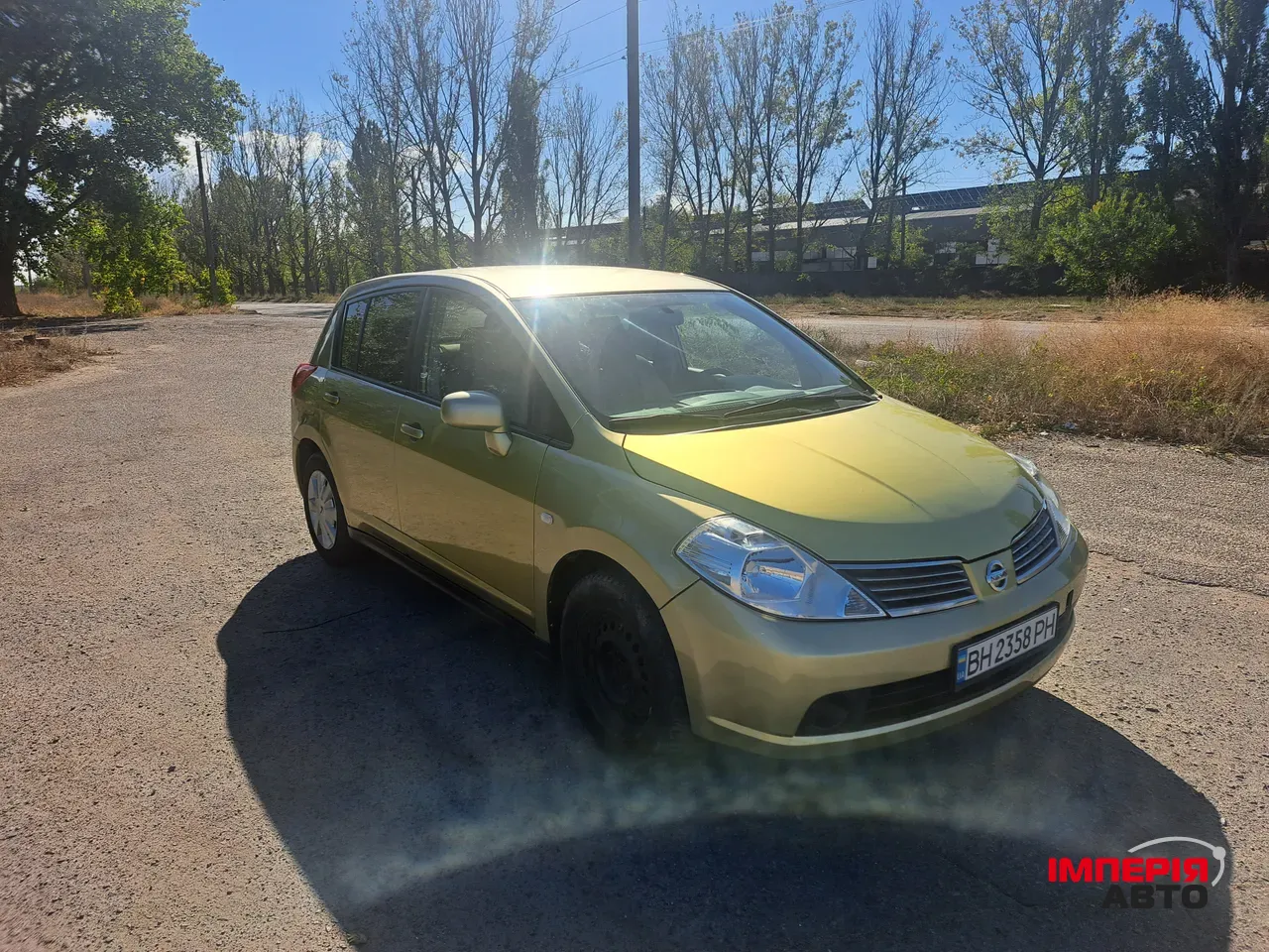 Nissan Tiida - фото 1