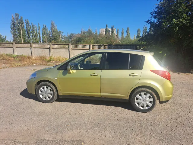 Nissan Tiida - фото 5