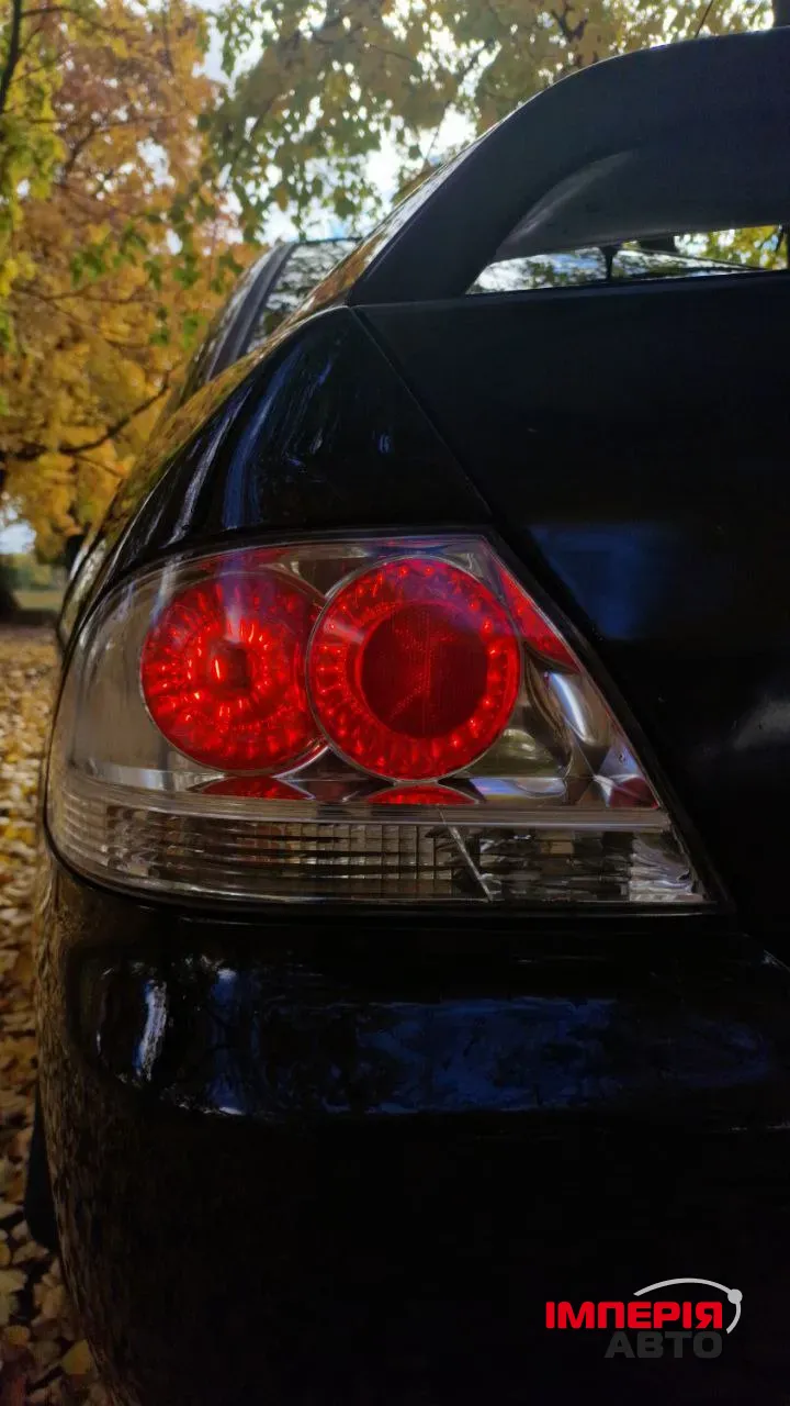 Mitsubishi Lancer - фото 3