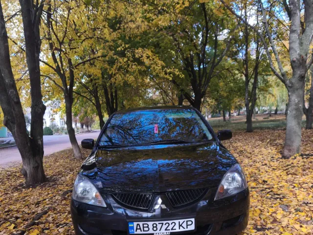 Mitsubishi Lancer - фото 2