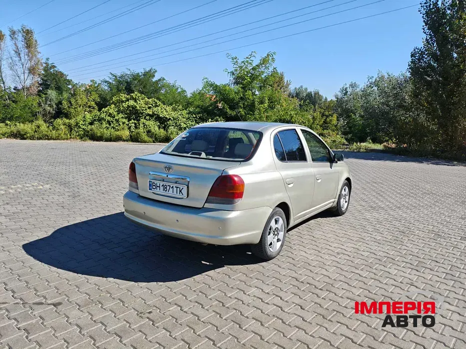 Toyota Echo - фото 5