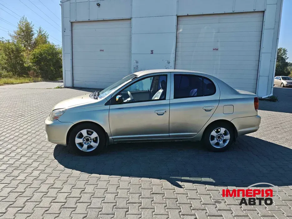 Toyota Echo - фото 4