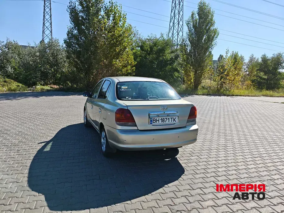 Toyota Echo - фото 6