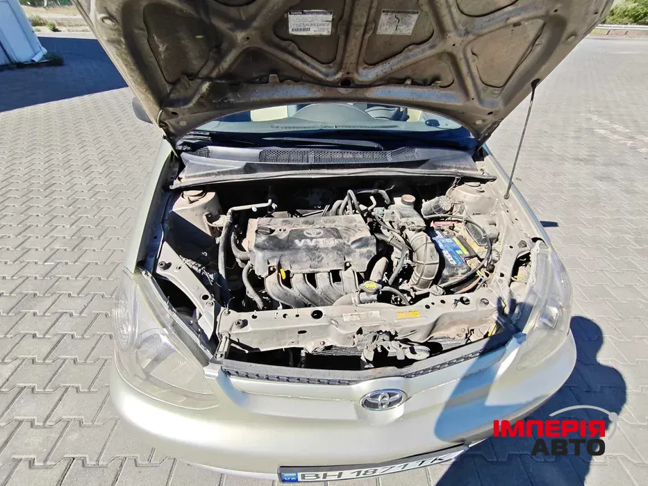 Toyota Echo - фото 10