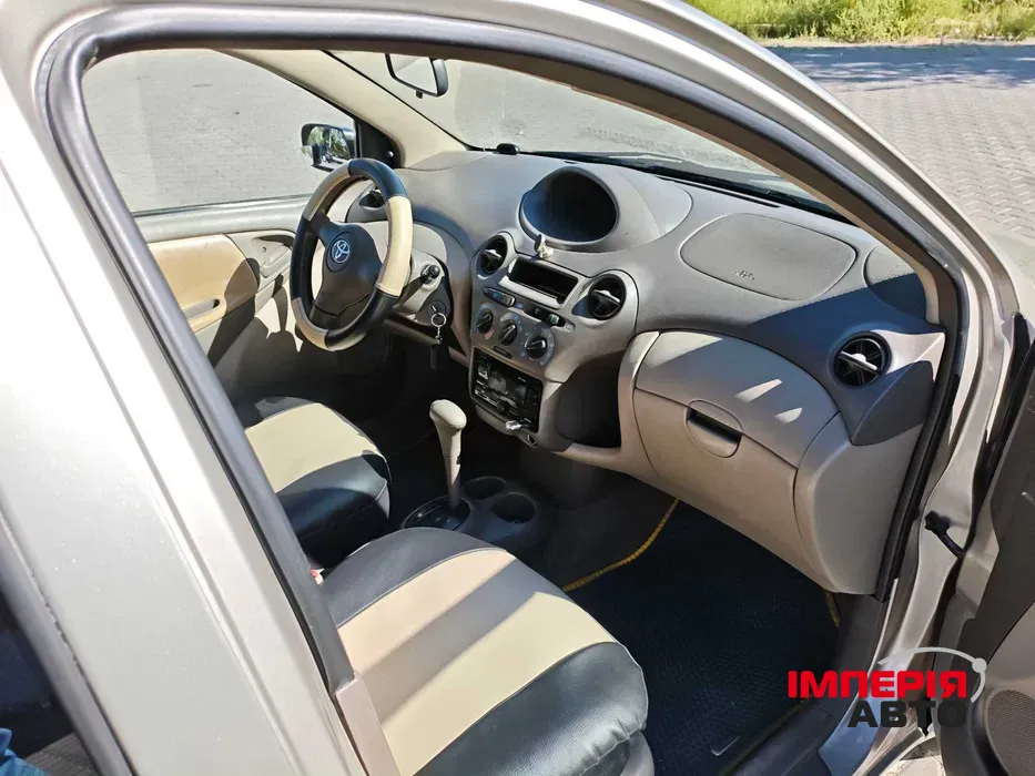 Toyota Echo - фото 11