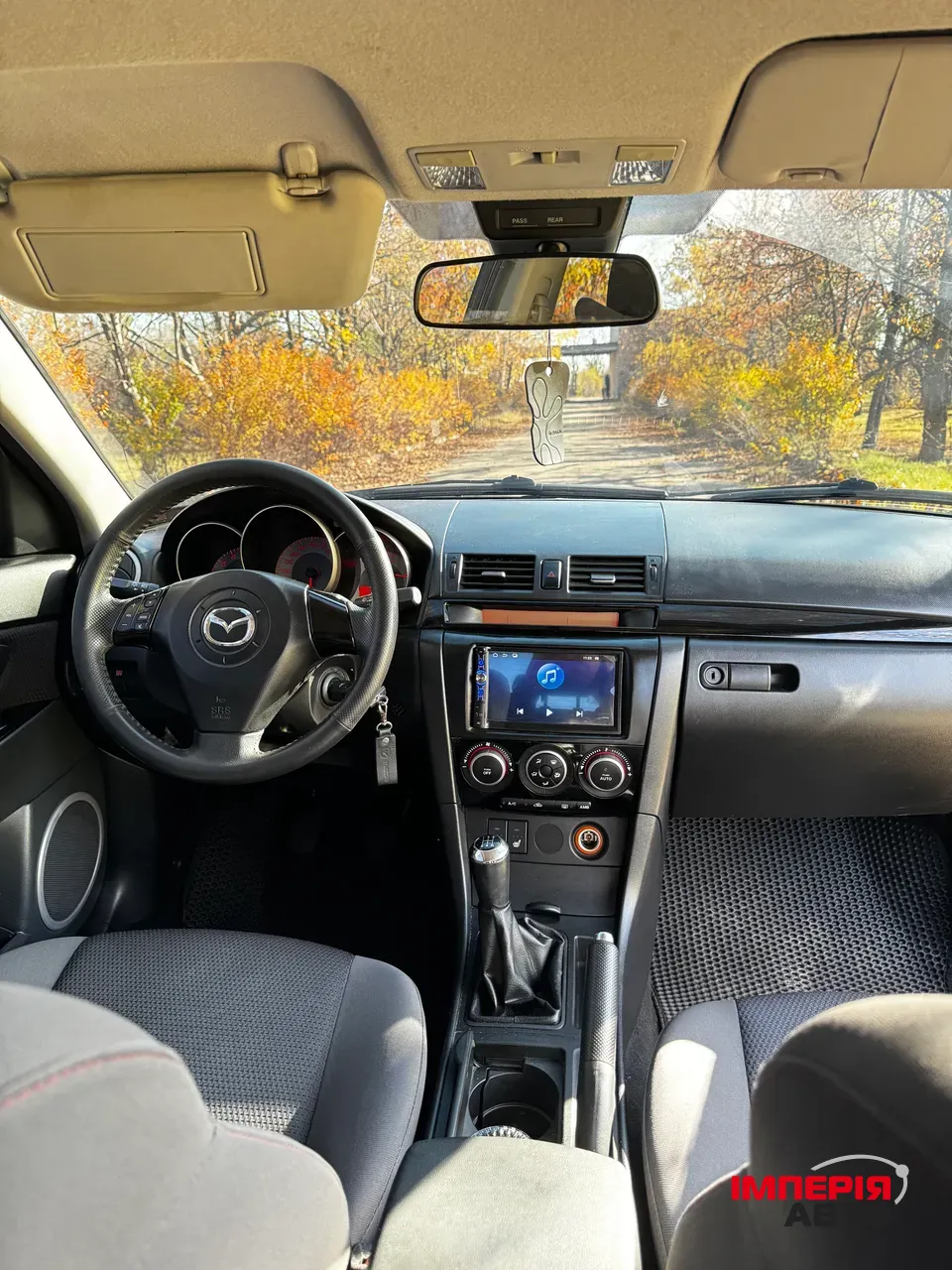 Mazda 3 - фото 13