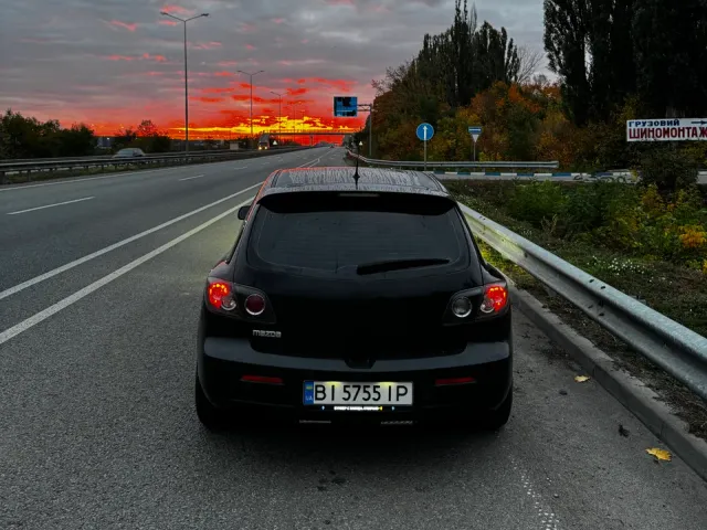 Mazda 3 - фото 2
