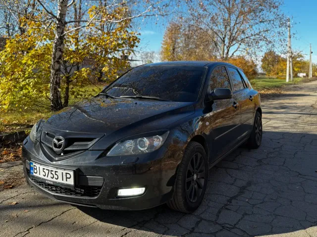 Mazda 3 - фото 3