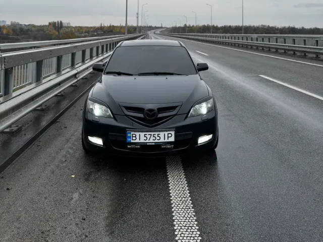 Mazda 3 - фото 1
