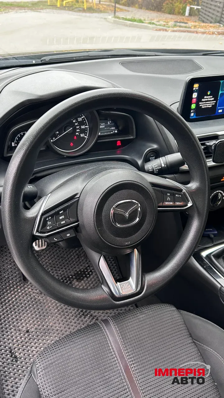 Mazda 3 - фото 10