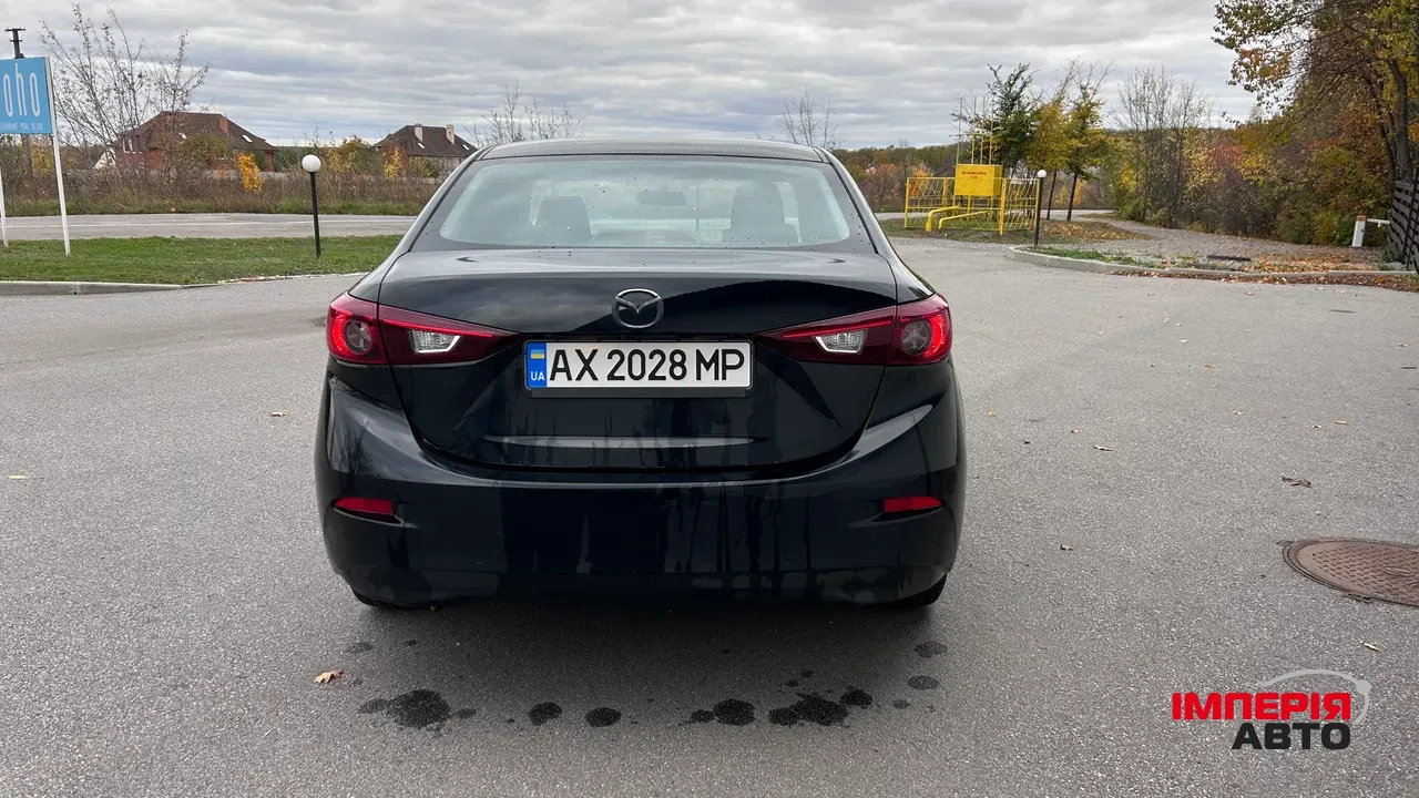 Mazda 3 - фото 6