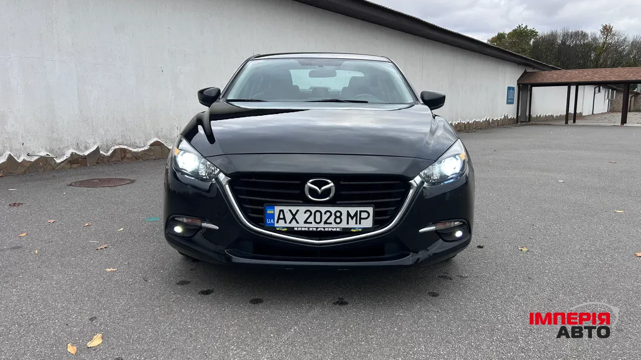 Mazda 3 - фото 2