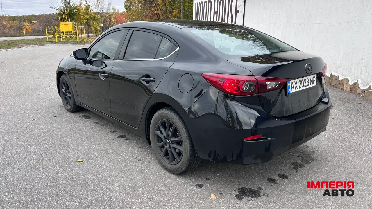 Mazda 3 - фото 7