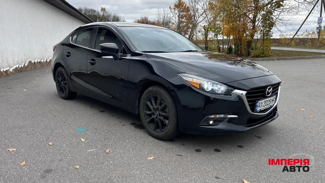Mazda 3 - фото 3