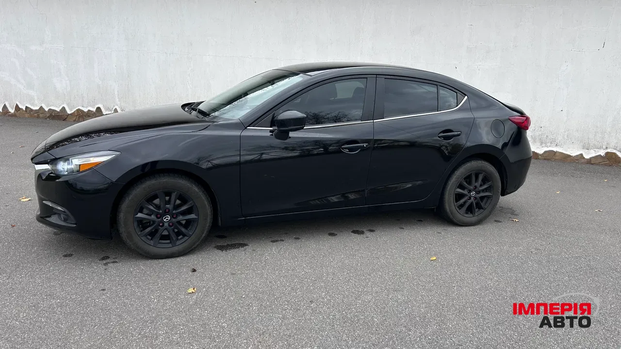 Mazda 3 - фото 8