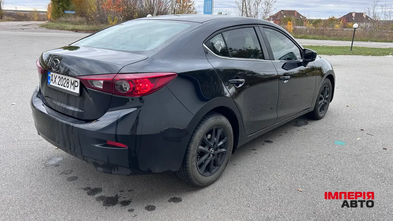 Mazda 3 - фото 5