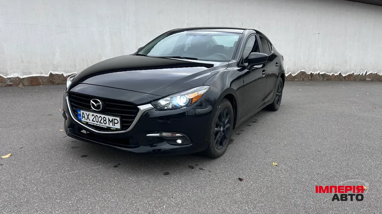 Mazda 3 - фото 1