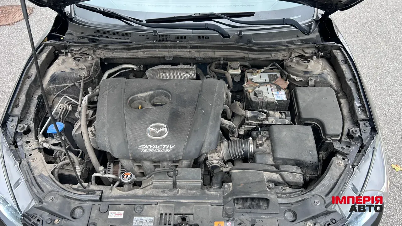 Mazda 3 - фото 11