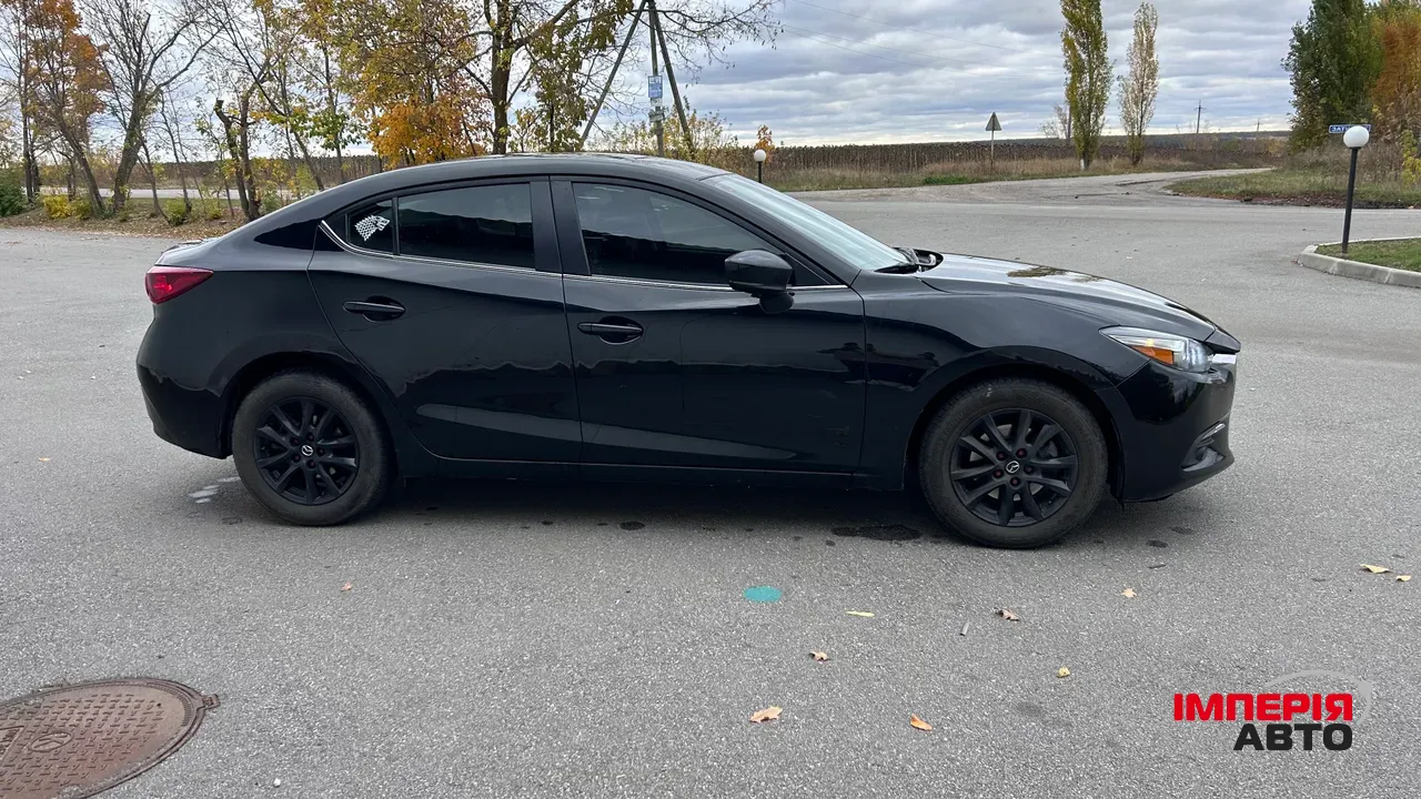 Mazda 3 - фото 4