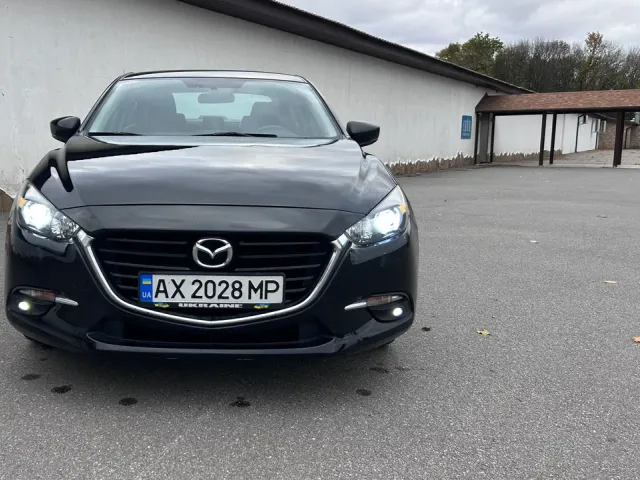 Mazda 3 - фото 2