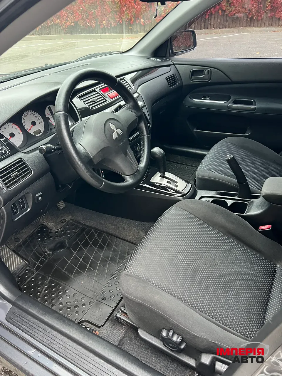 Mitsubishi Lancer - фото 8