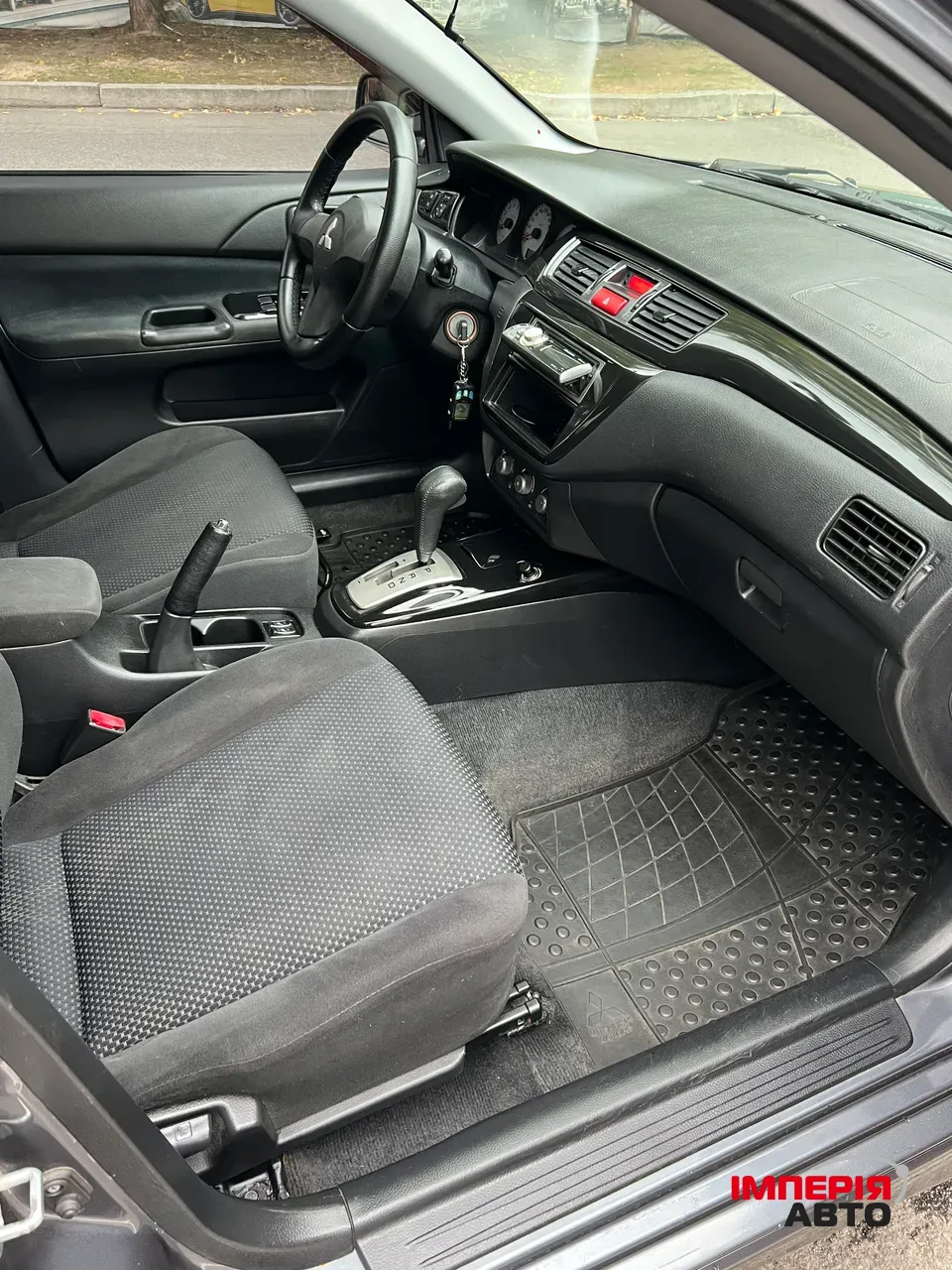 Mitsubishi Lancer - фото 12