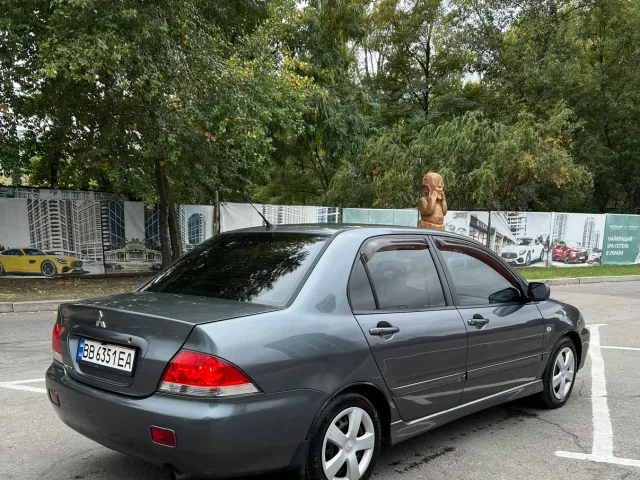 Mitsubishi Lancer - фото 3