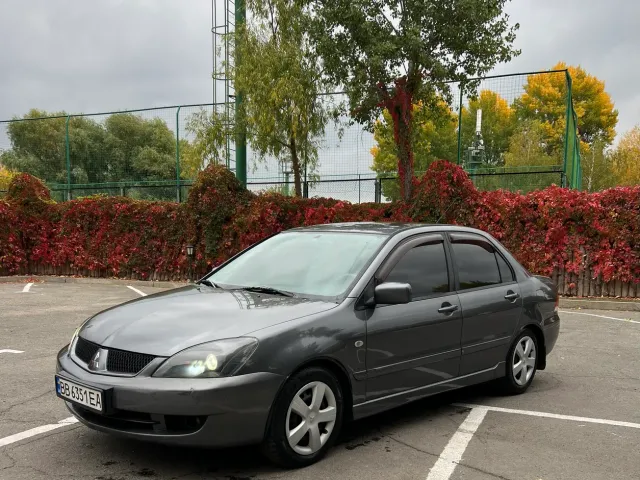 Mitsubishi Lancer - фото 1
