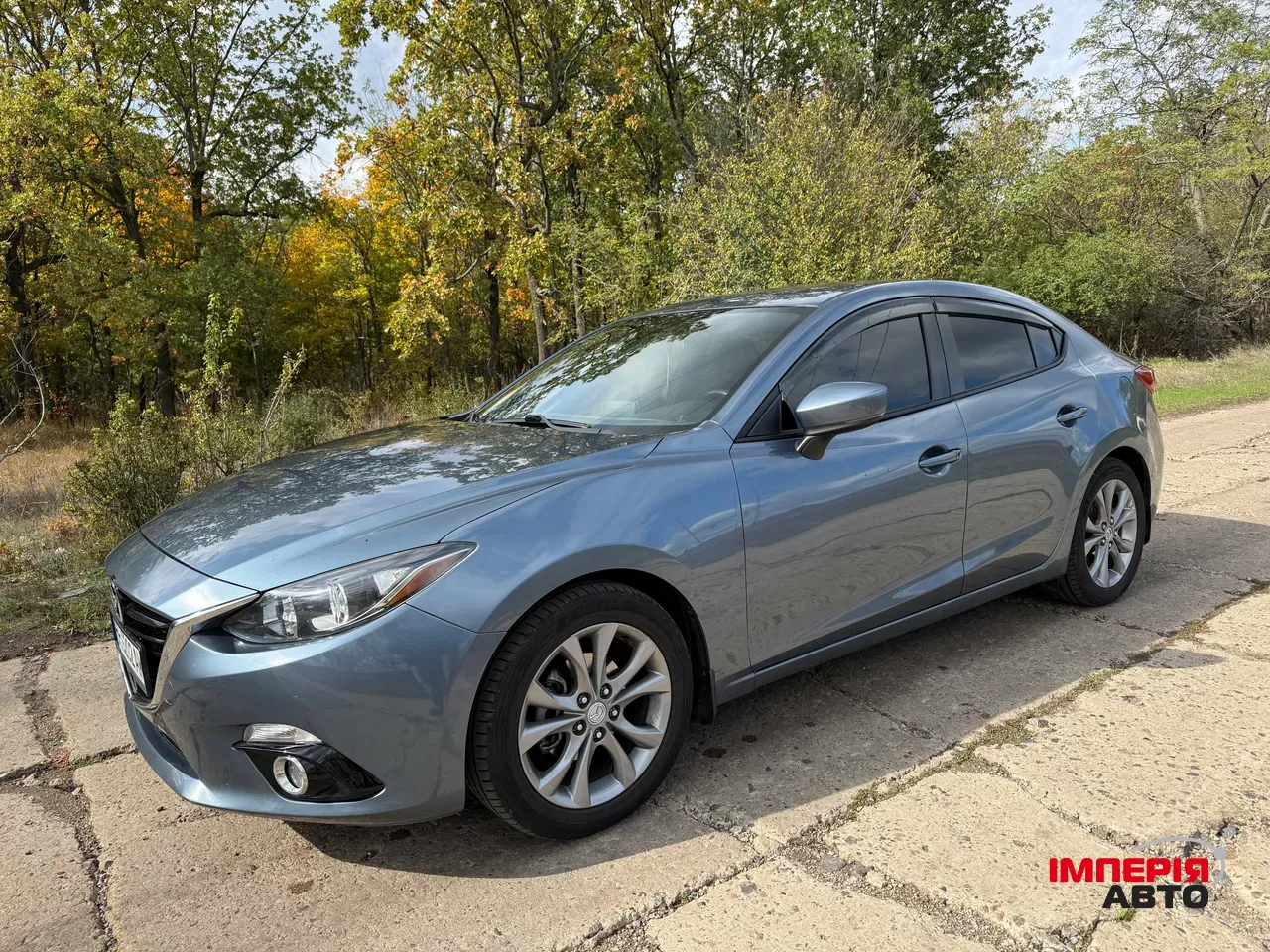 Mazda 3 - фото 5