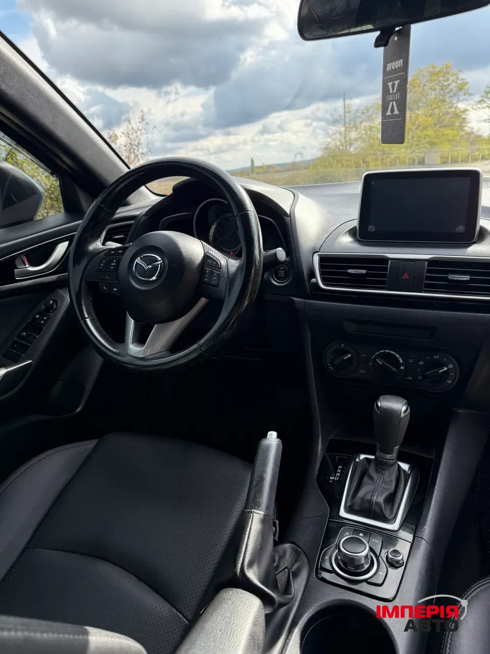 Mazda 3 - фото 10