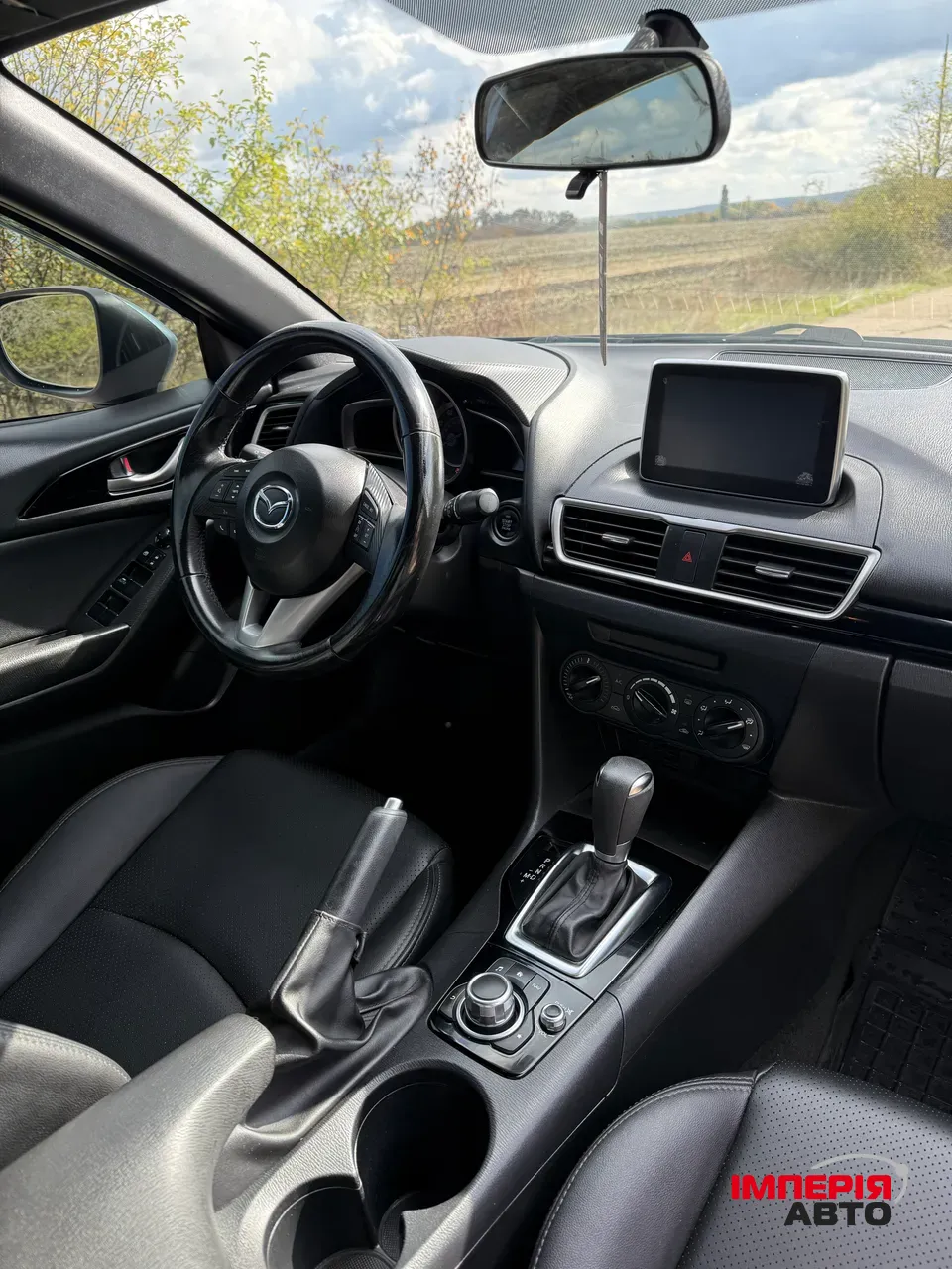 Mazda 3 - фото 11