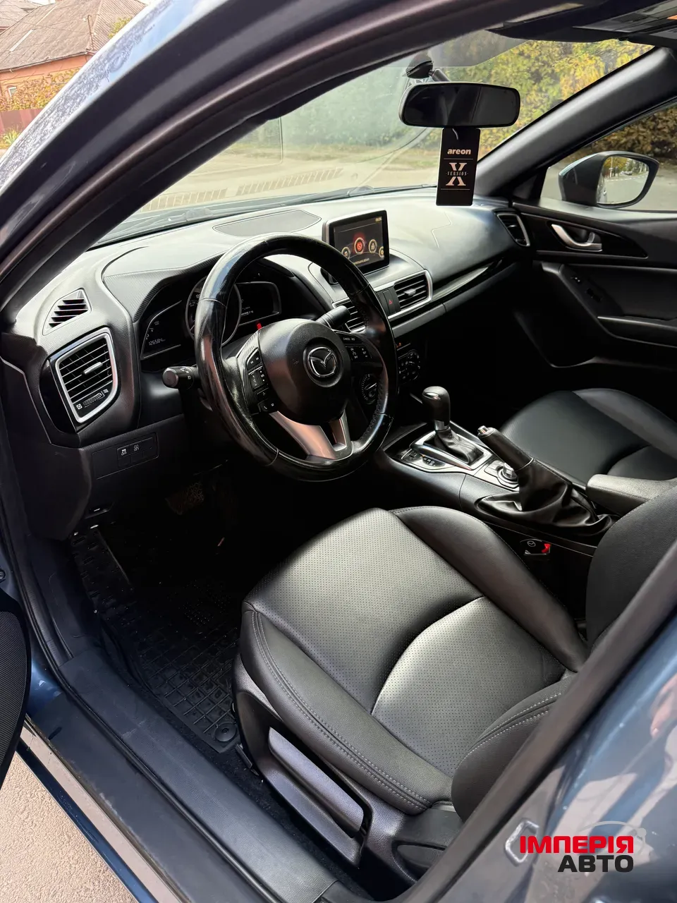 Mazda 3 - фото 14