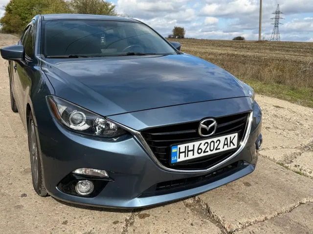 Mazda 3 - фото 1