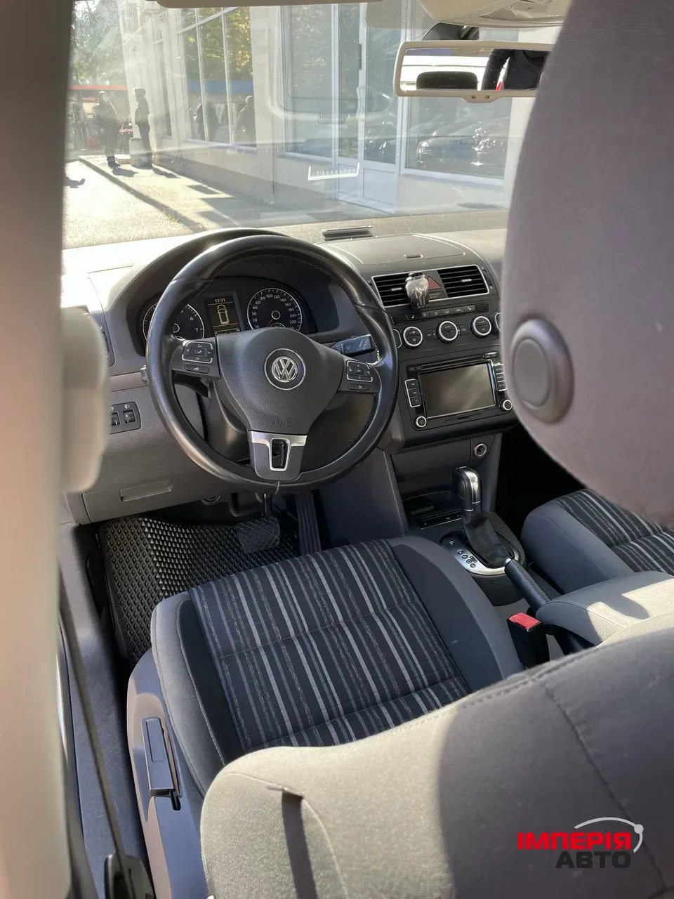 Volkswagen Touran - фото 16